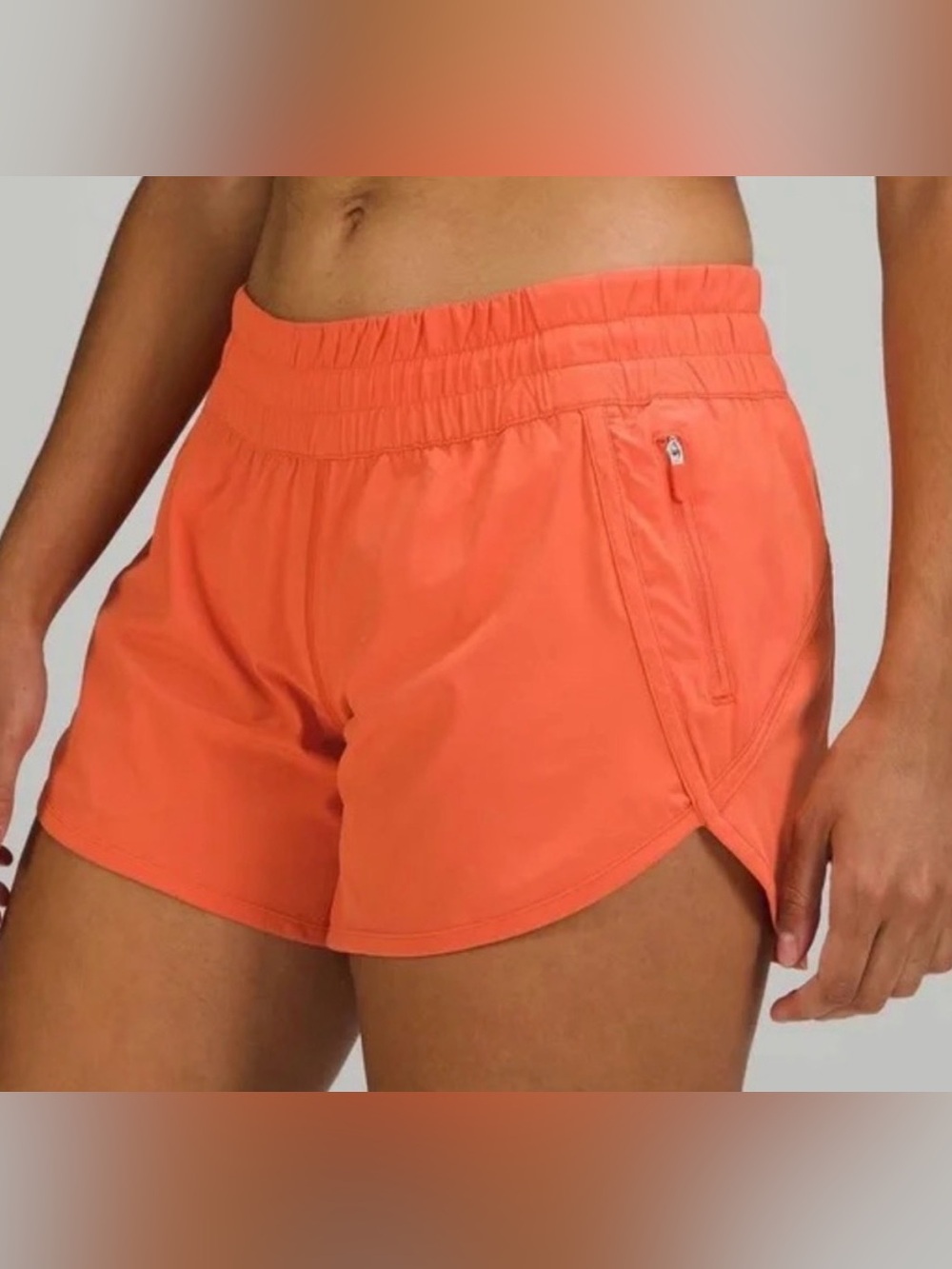 Lululemon Tracker Short in bright orange size 6 4 inch inseam